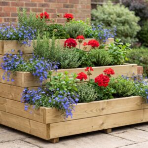 Thornbury three-tier timber planter on a patio planted with lobelia, geraniums and herbs